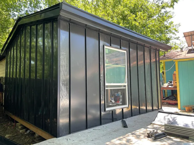 Black standing seam metal wall panels for Roof Inspection in Summit Park