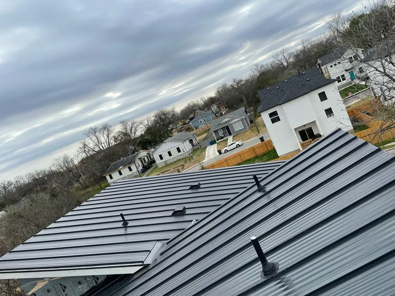 Standing seam metal roof panels with vents for Skylight Repair in Summit Park